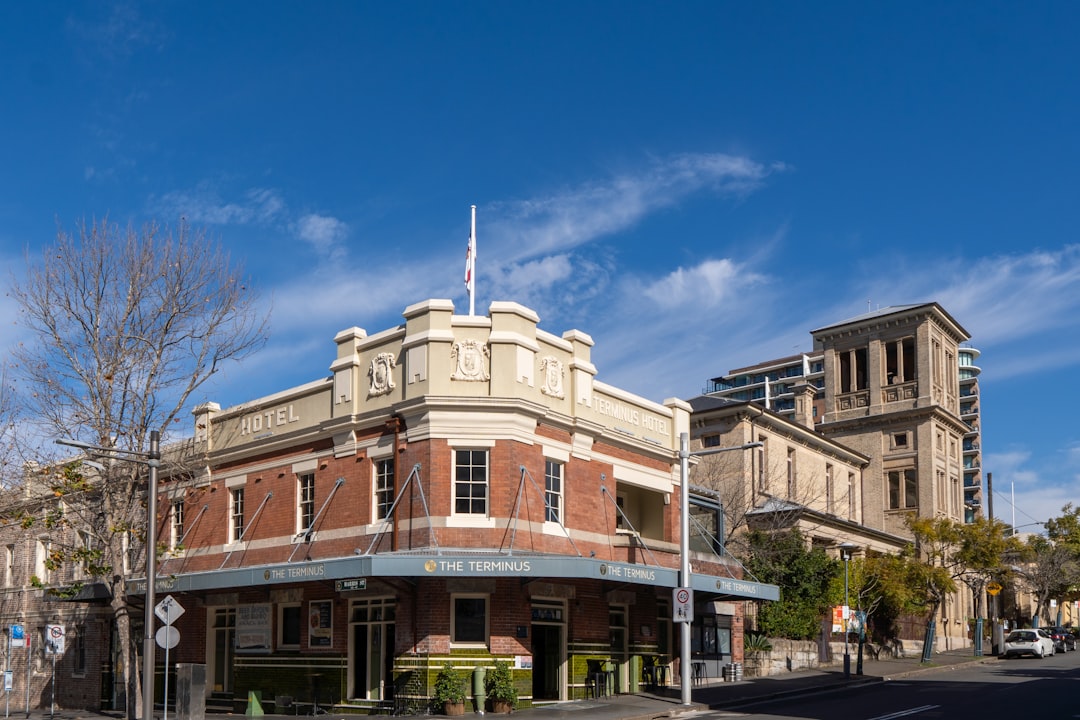 An old brick building on a street corner
